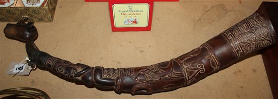 Tribal fertility horn with bronze animal head